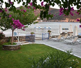 The patio with the sunbeds at Studios Nikos
