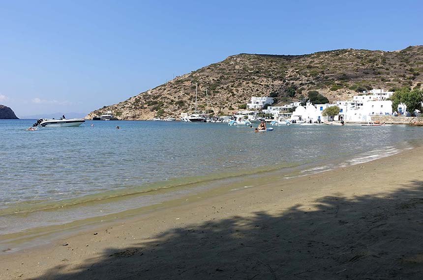 The beach and the church of Taxiarchis at Vathi